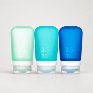 humangear GoToob+ three-pack 2.5 fl oz / 74 mL, pale mint left, bright aqua center, deep blue-teal right