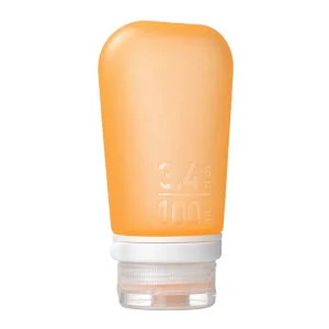 humangear GoToob+ Orange 3.4 Ounces silicone travel bottle on white background